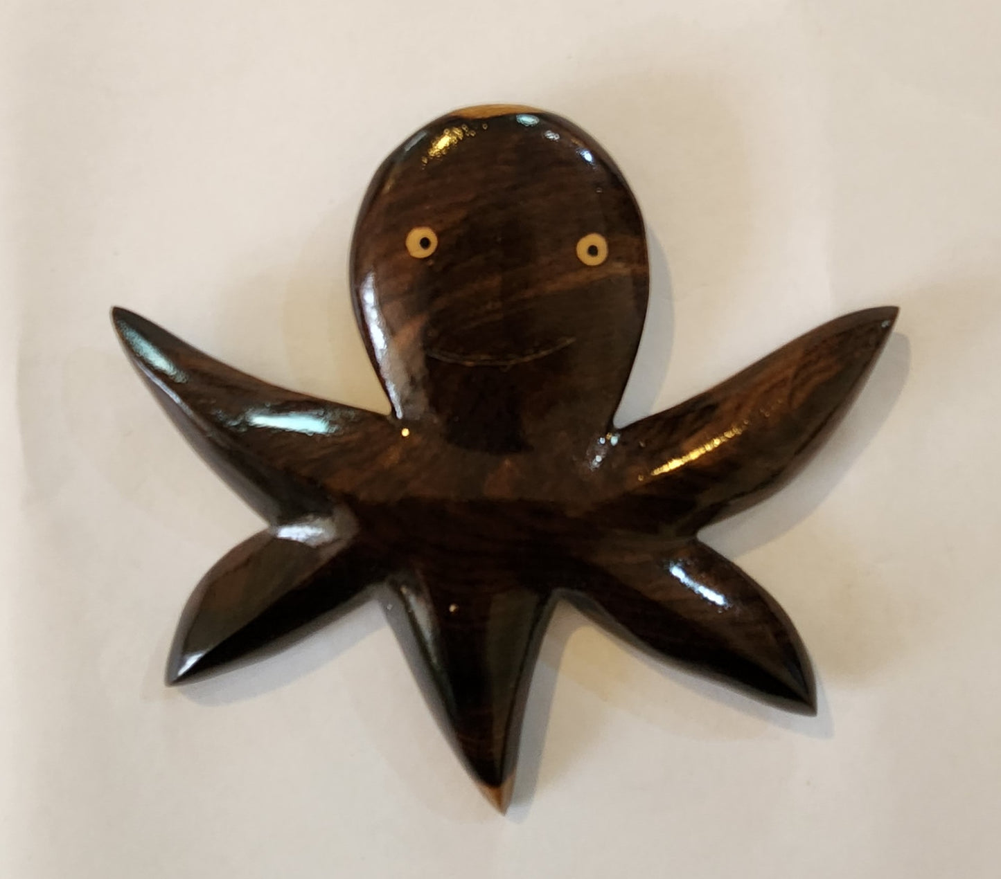 Hand Carved Happy Octopus Wall Hanging from Local Tau Wood