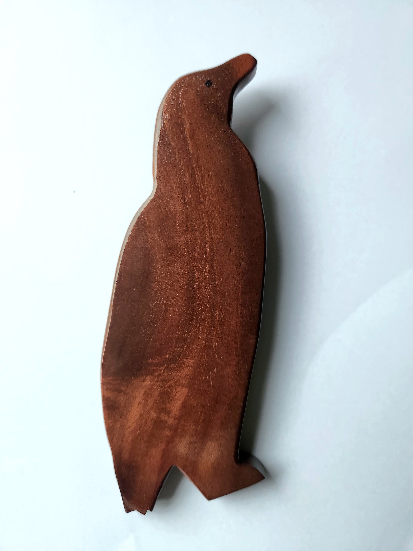 Hand Carved Playful Paddle Penguin Wall Hanging - Burau or Miro wood