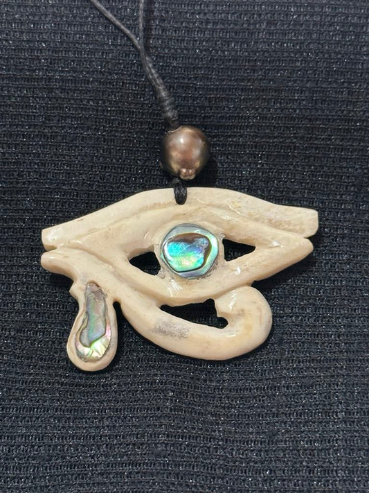 Hand carved Eye of Horus necklace -  Tahitian Black Pearl & Cattle Bone