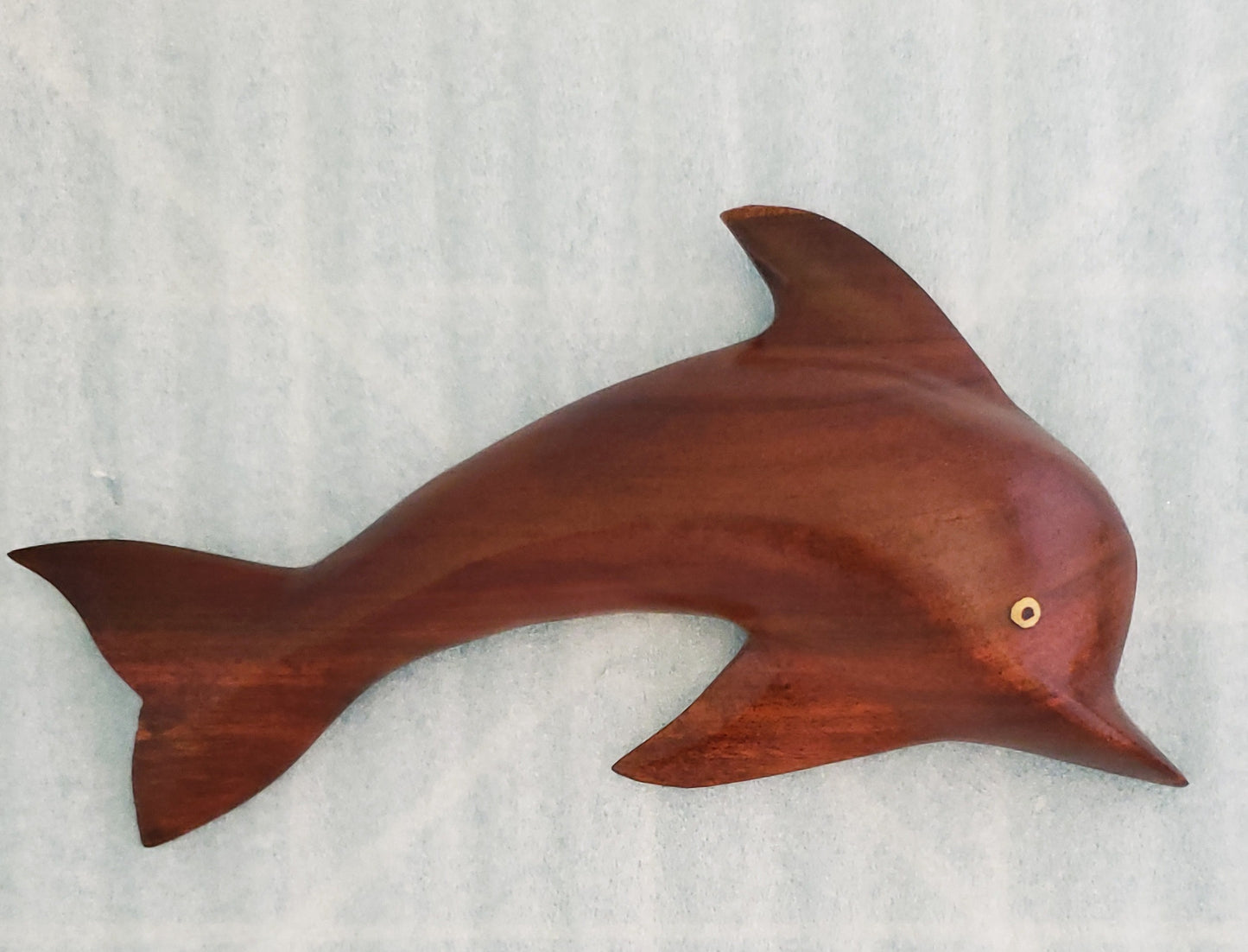 Hand carved Dolphin from either Miro or Burau wood