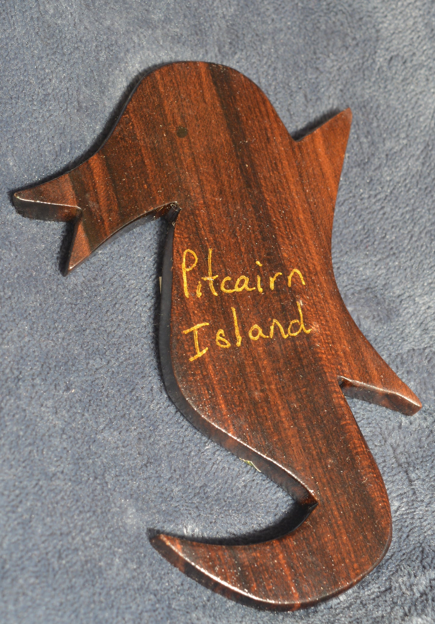 Hand carved fridge magnet