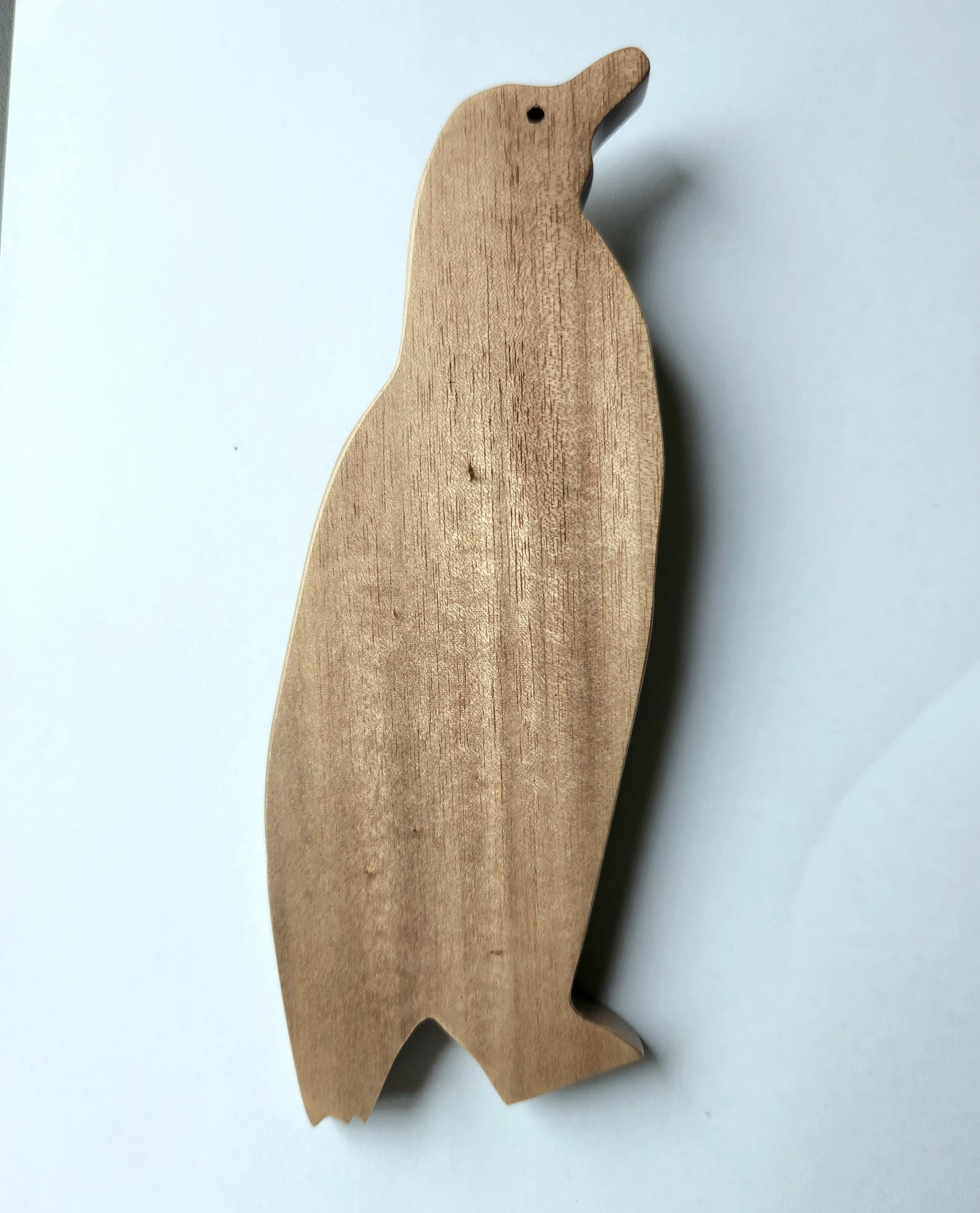 Hand Carved Playful Paddle Penguin Wall Hanging - Burau or Miro wood