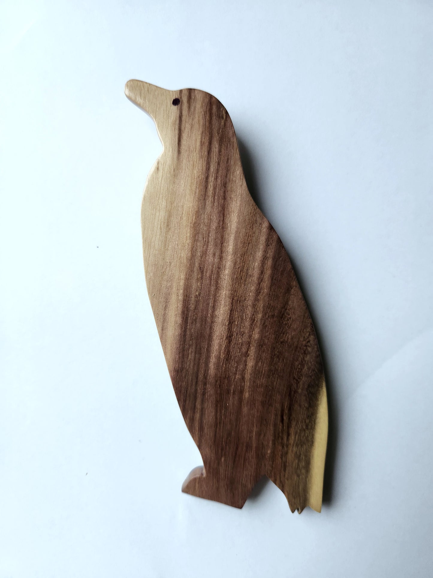 Hand Carved Playful Paddle Penguin Wall Hanging - Burau or Miro wood