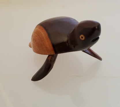 Hand Carved Baby Turtle from either local Miro or Burau woods