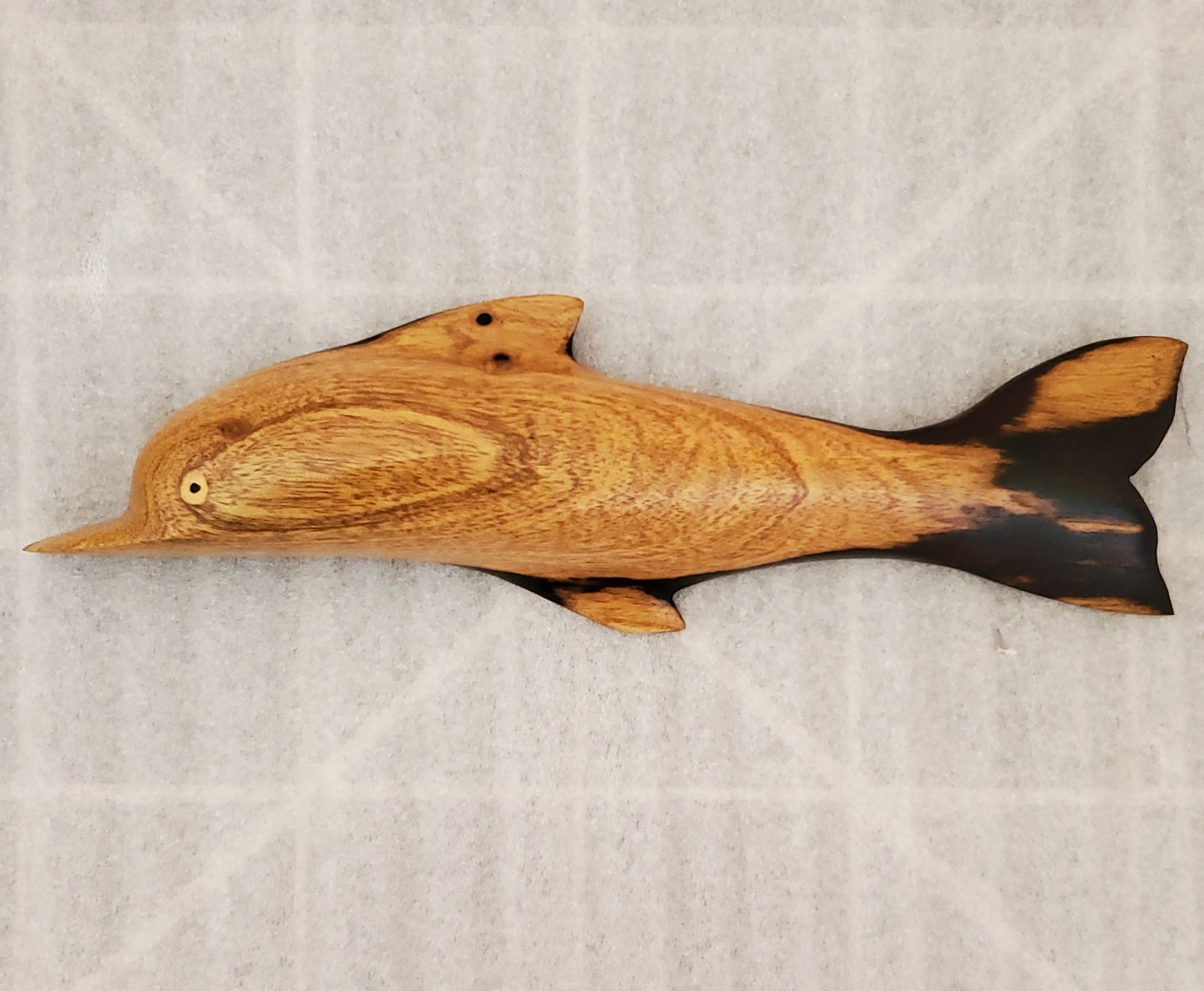 Hand Carved Dolphin Wall Hanging from Local Tau Wood.