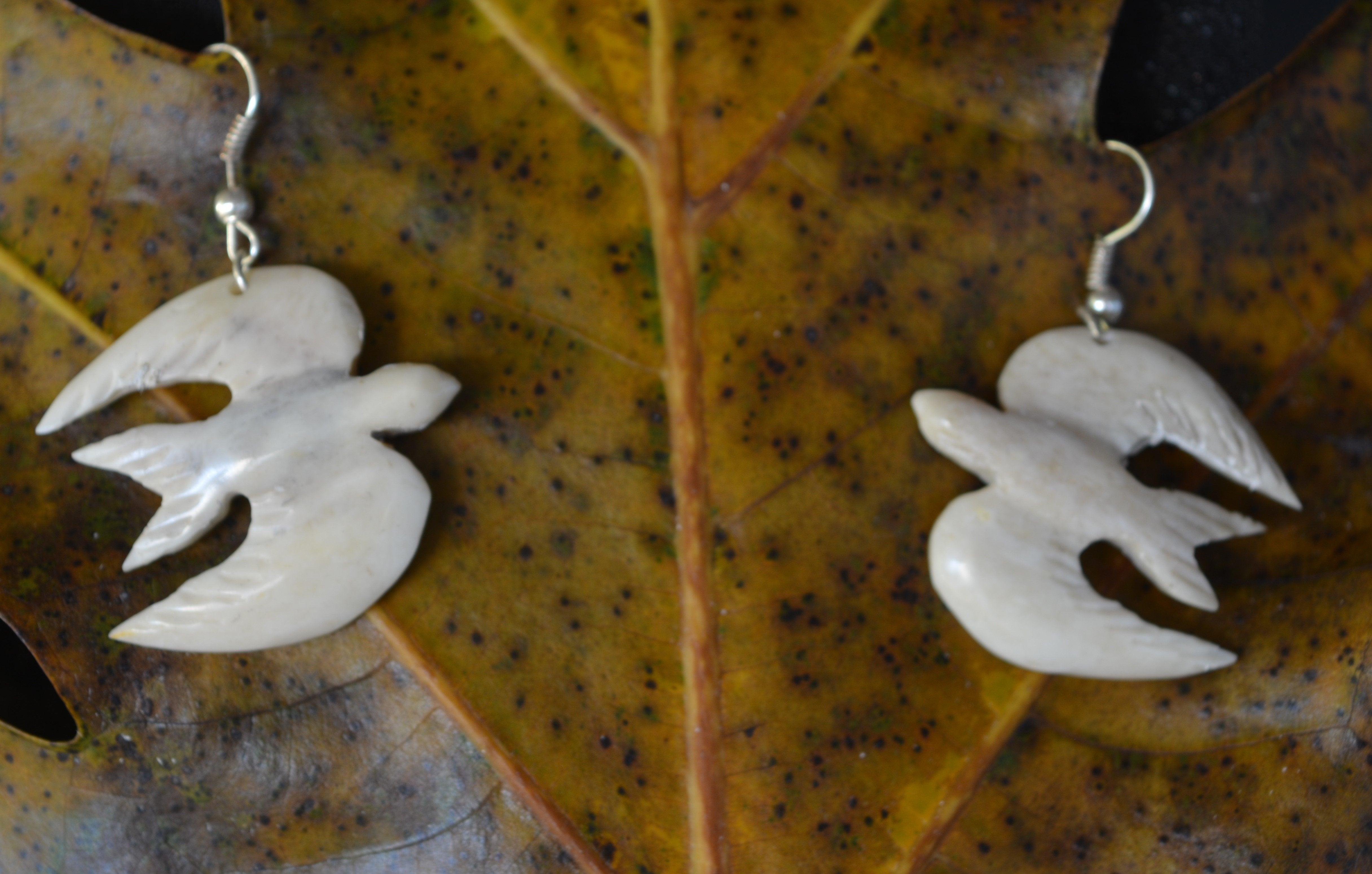 Hand carved bone earrings 