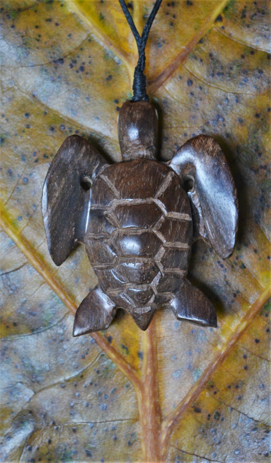 Hand carved wooden turtle necklace