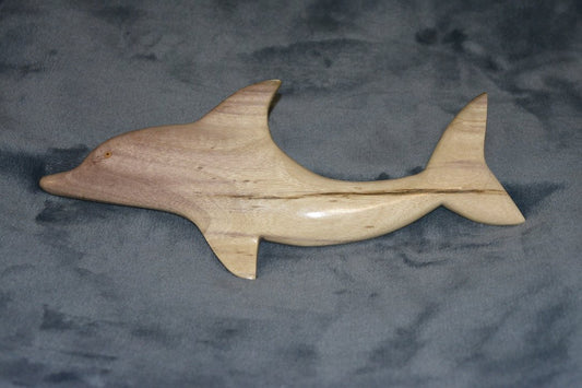 Dolphin carved from local wood