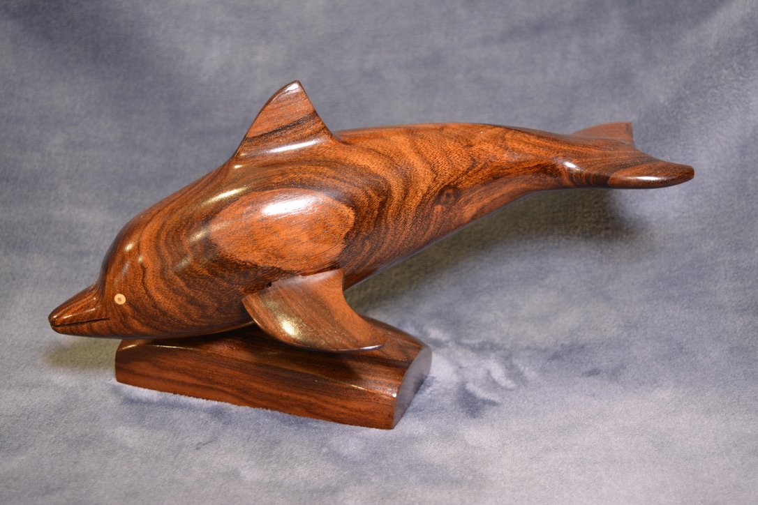 Dolphin carved from local wood