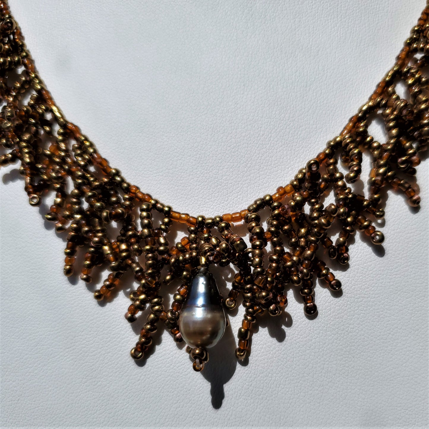 Tahitian Teardrop Keshi Pearl Necklace with Bronze Coral Beading