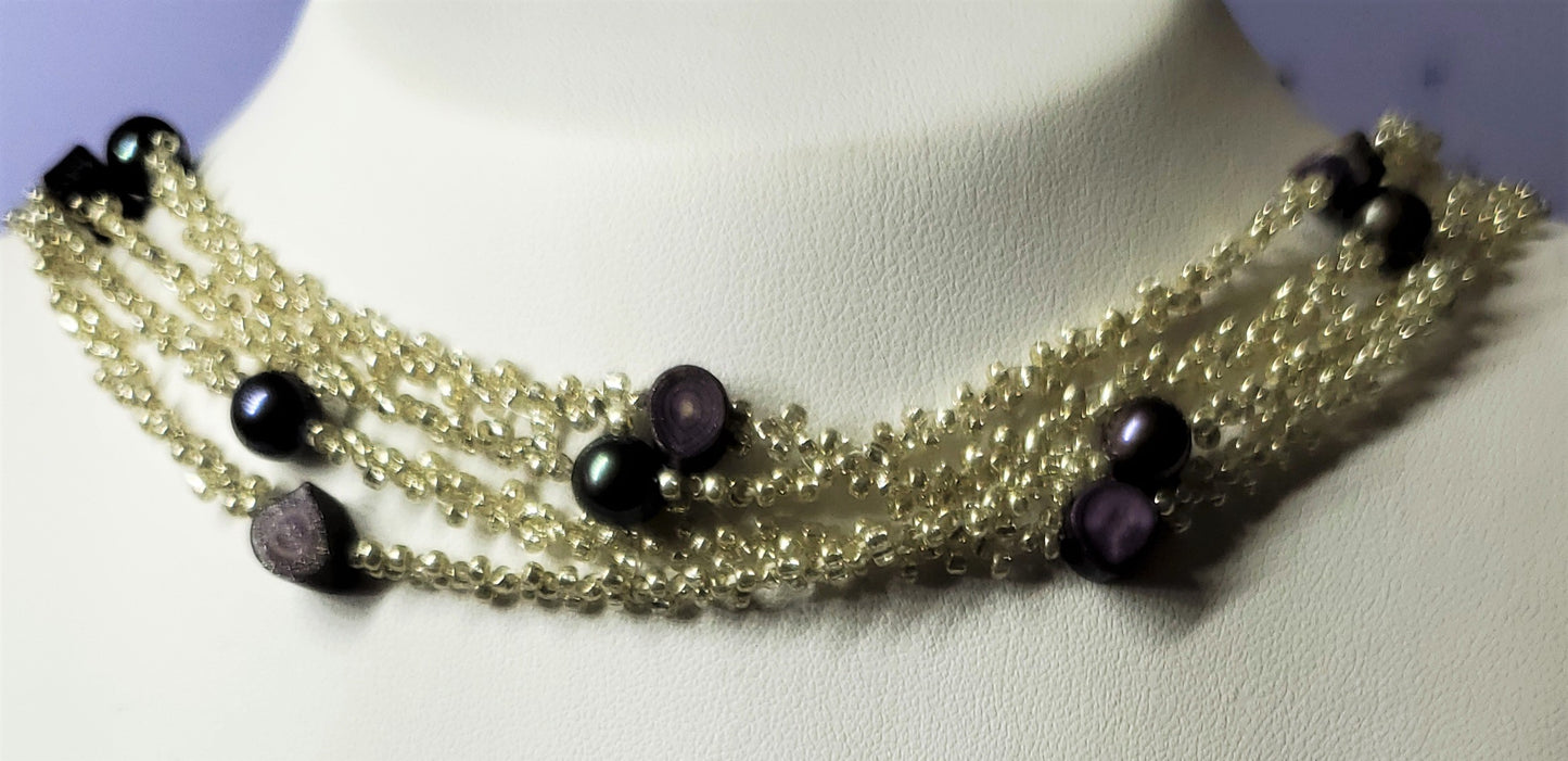 Collar envolvente hecho a mano con perlas negras del Pacífico y Fetuei con cuentas de plata