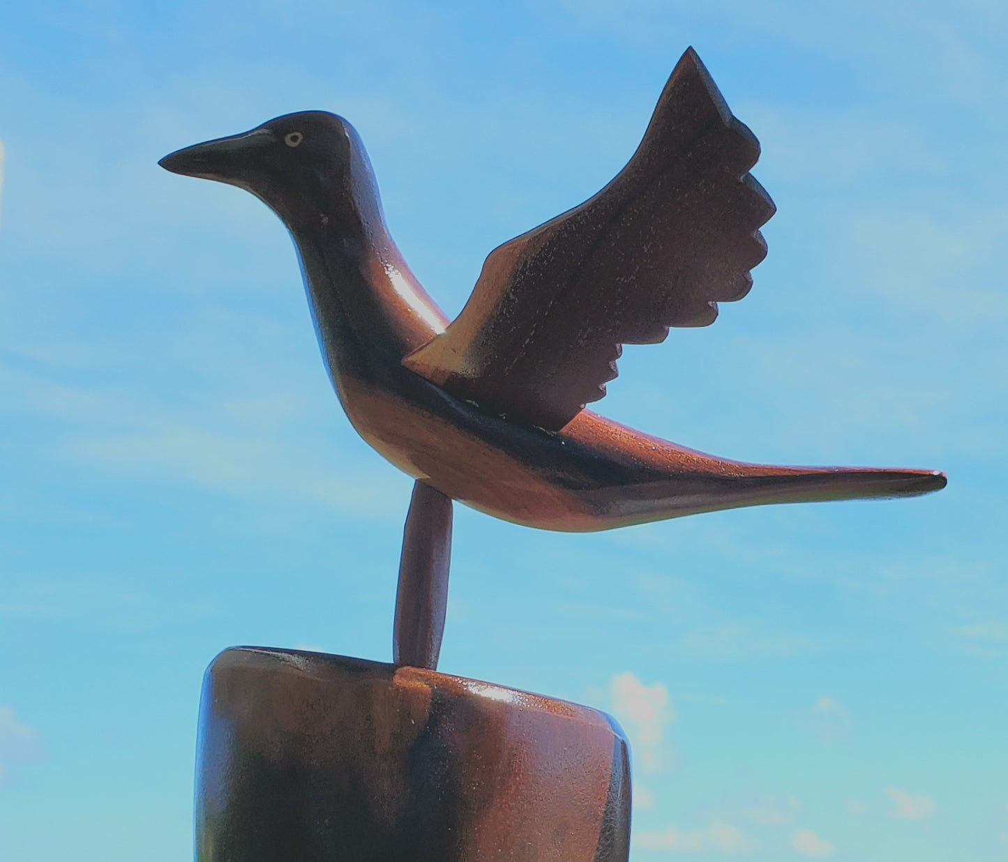 Hand carved Bird in flight on a Stand - from local Miro wood